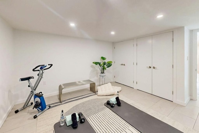 workout room with baseboards and recessed lighting