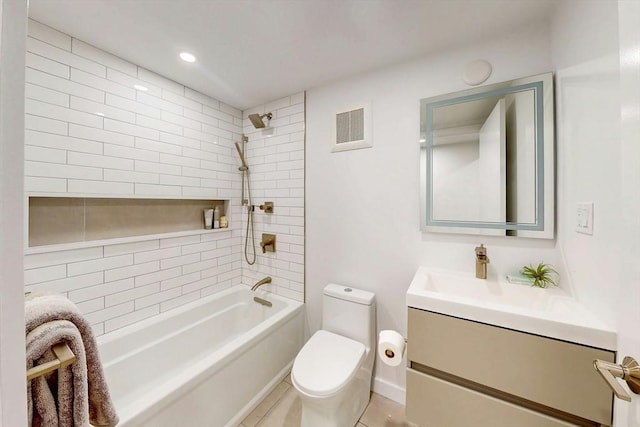 full bath featuring toilet, shower / washtub combination, vanity, and tile patterned floors