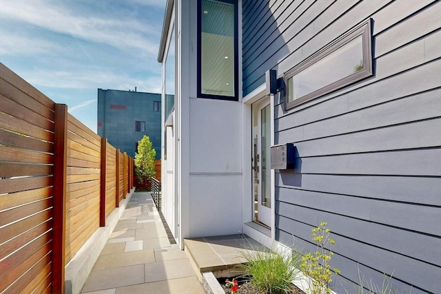 view of side of property with fence