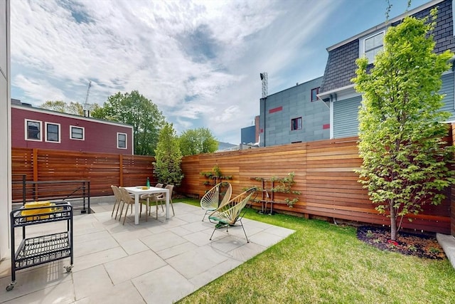 view of patio featuring outdoor dining area