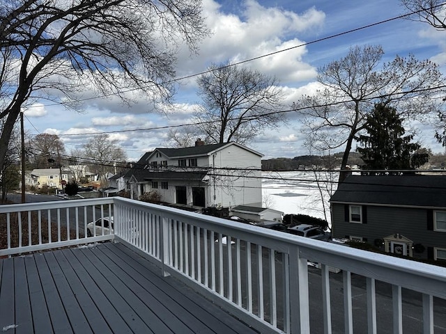 snow covered deck featuring a grill