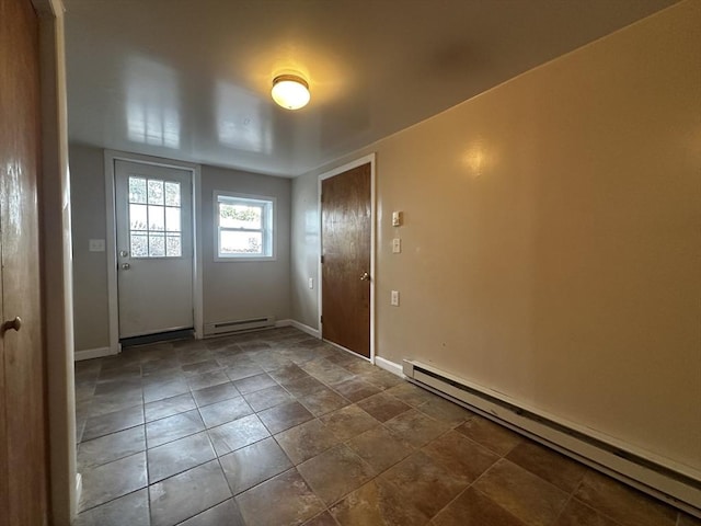 doorway featuring baseboard heating