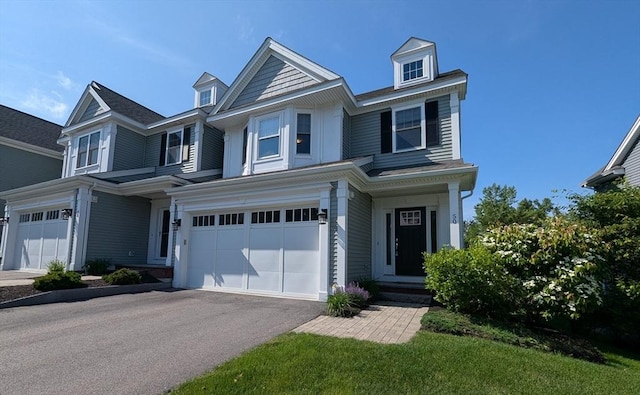 50 Brookview Rd Unit 50, Franklin, MA 02038 - view of front facade featuring driveway and an attached garage