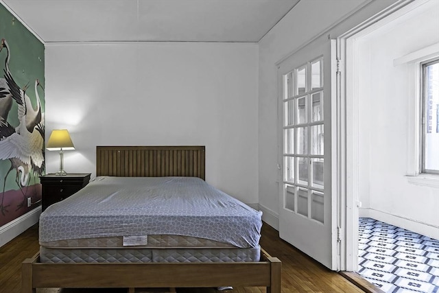 108 Washington St Unit 3, Boston, MA 02135 - bedroom with baseboards and wood finished floors