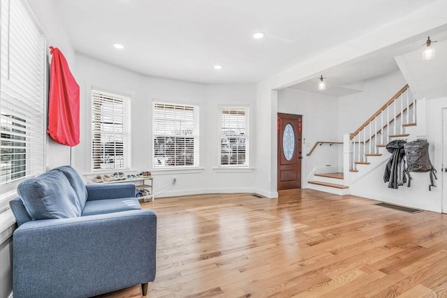 entryway with light hardwood / wood-style flooring