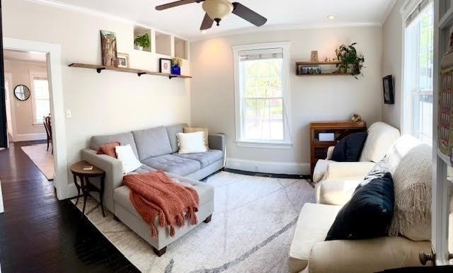 60 King St, Swampscott, MA 01907 - living area featuring ornamental molding, ceiling fan, wood finished floors, and baseboards