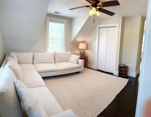 60 King St, Swampscott, MA 01907 - living room with a ceiling fan, baseboards, lofted ceiling, and wood finished floors