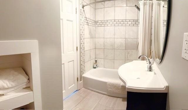 60 King St, Swampscott, MA 01907 - bathroom featuring shower / bath combination with curtain and vanity