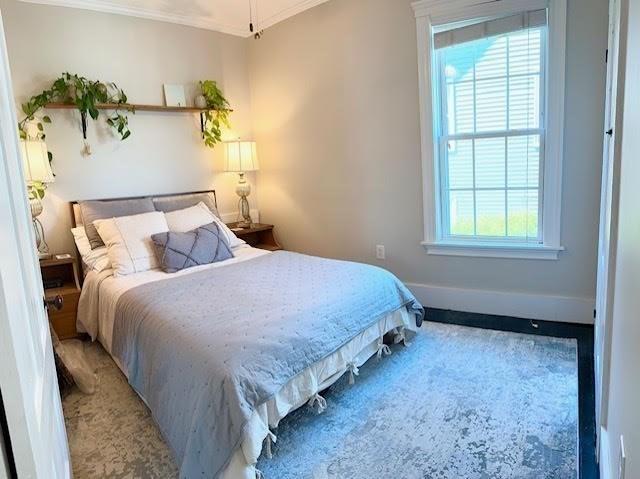 60 King St, Swampscott, MA 01907 - bedroom featuring crown molding and baseboards