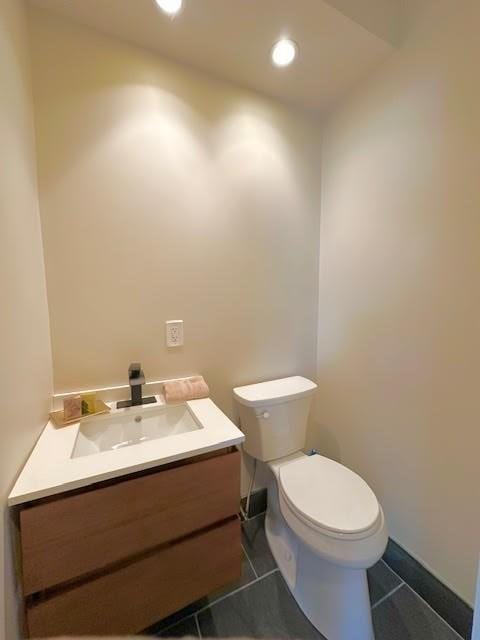 60 King St, Swampscott, MA 01907 - bathroom featuring vanity, toilet, tile patterned flooring, and recessed lighting