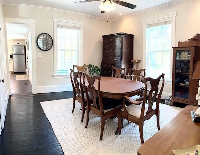 60 King St, Swampscott, MA 01907 - dining area featuring a ceiling fan, wood finished floors, crown molding, and baseboards