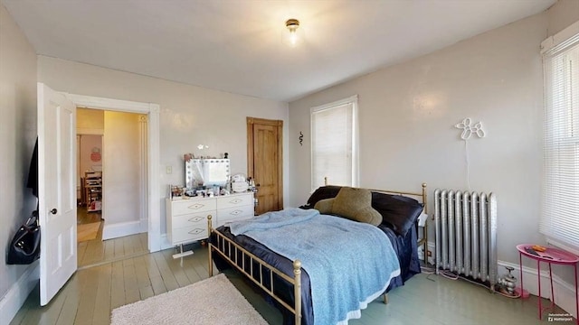 48 Summer St, Adams, MA 01220 - bedroom with radiator and hardwood / wood-style floors