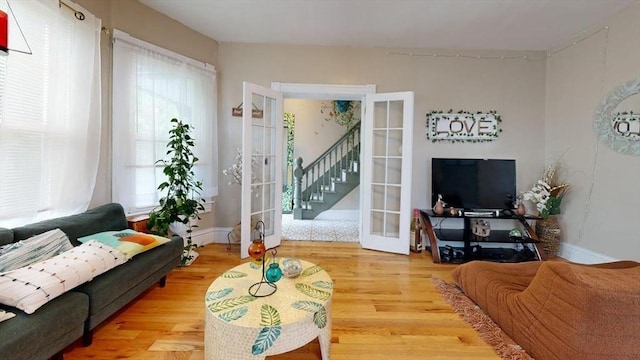 48 Summer St, Adams, MA 01220 - living room featuring french doors and wood finished floors