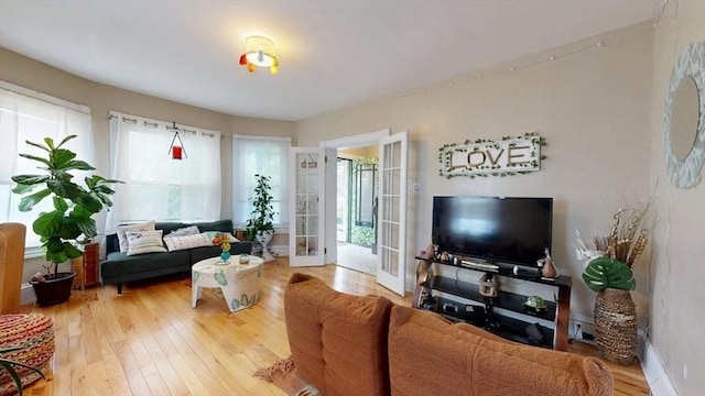 48 Summer St, Adams, MA 01220 - living room featuring light wood-style flooring and french doors