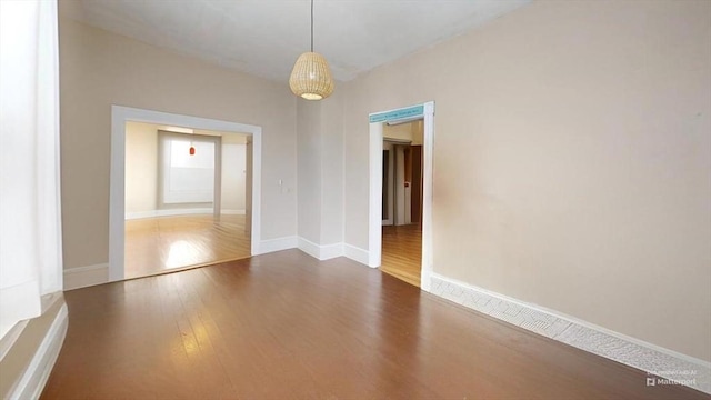 48 Summer St, Adams, MA 01220 - unfurnished dining area with wood finished floors and baseboards