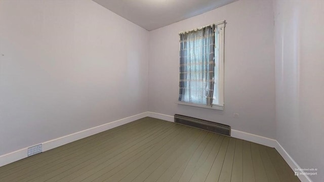 48 Summer St, Adams, MA 01220 - unfurnished room with a baseboard heating unit and baseboards