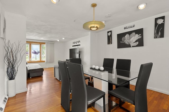 26 Hemlock Ter, Randolph, MA 02368 - dining space with recessed lighting, wood finished floors, and baseboards