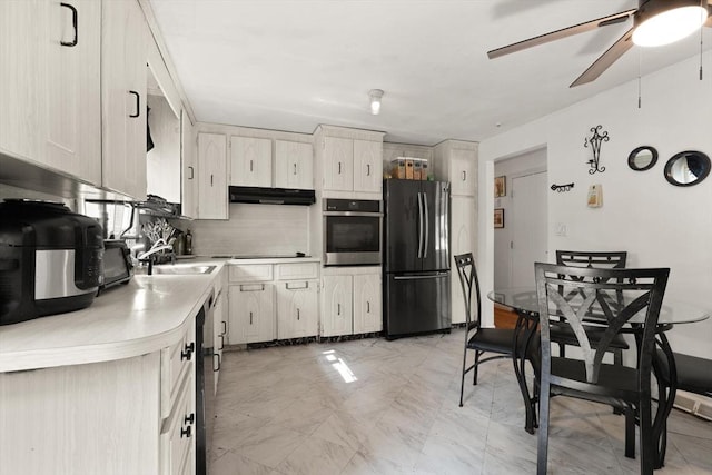 26 Hemlock Ter, Randolph, MA 02368 - kitchen featuring freestanding refrigerator, oven, under cabinet range hood, ceiling fan, and a sink