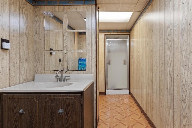 26 Hemlock Ter, Randolph, MA 02368 - full bath with wood walls, vanity, and a stall shower