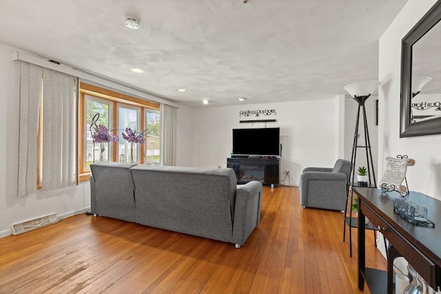 26 Hemlock Ter, Randolph, MA 02368 - living room featuring wood-type flooring and recessed lighting