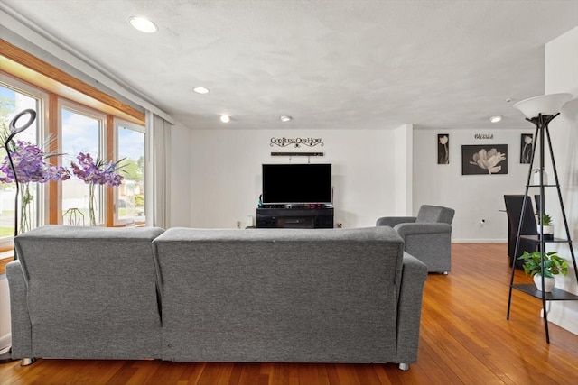 26 Hemlock Ter, Randolph, MA 02368 - living area with wood finished floors, recessed lighting, and baseboards