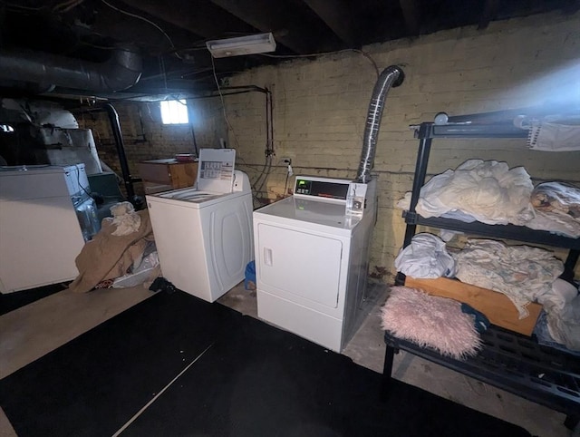 laundry room featuring laundry area and washer and clothes dryer