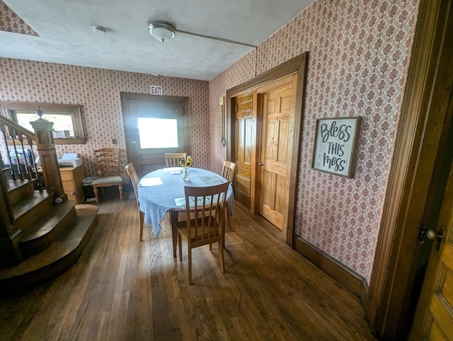 dining room featuring dark hardwood / wood-style flooring