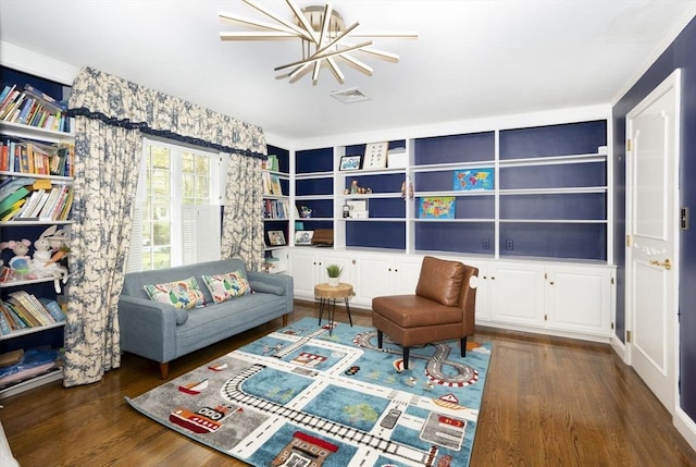 20 Albee Dr, Braintree, MA 02184 - living area with wood finished floors, built in features, and a chandelier