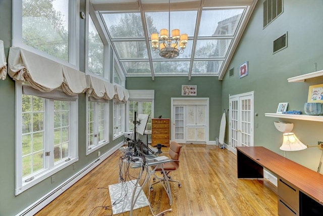 20 Albee Dr, Braintree, MA 02184 - sunroom with french doors, a baseboard heating unit, and a chandelier