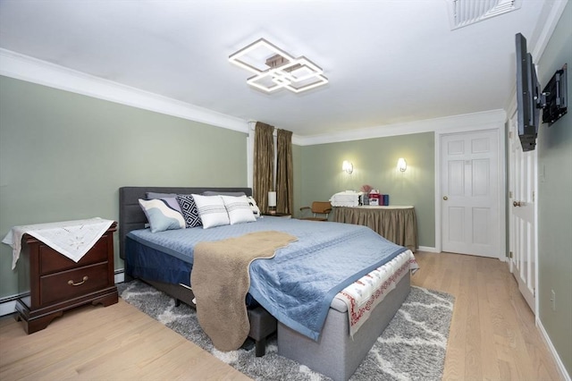 20 Albee Dr, Braintree, MA 02184 - bedroom with crown molding, light wood finished floors, and baseboards