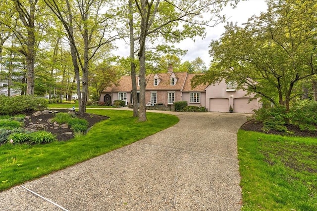 20 Albee Dr, Braintree, MA 02184 - cape cod home featuring concrete driveway and a front yard
