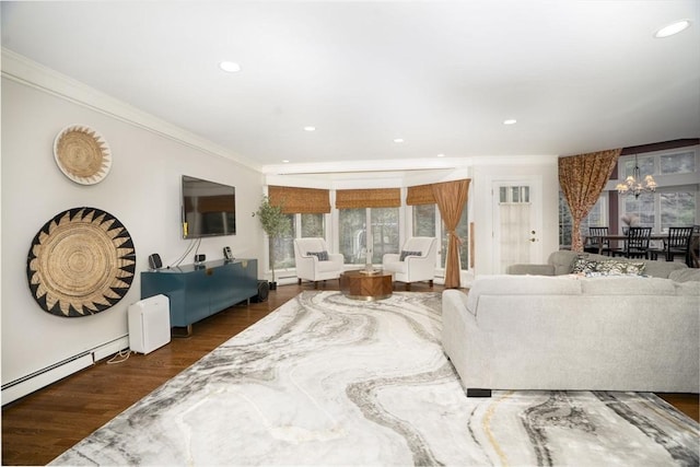 20 Albee Dr, Braintree, MA 02184 - living area with a chandelier, wood finished floors, ornamental molding, and recessed lighting
