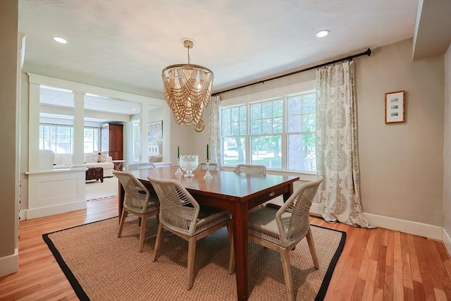 5 Baxter St, Westborough, MA 01581 - dining space featuring a chandelier, baseboards, light wood-style flooring, ornate columns, and recessed lighting