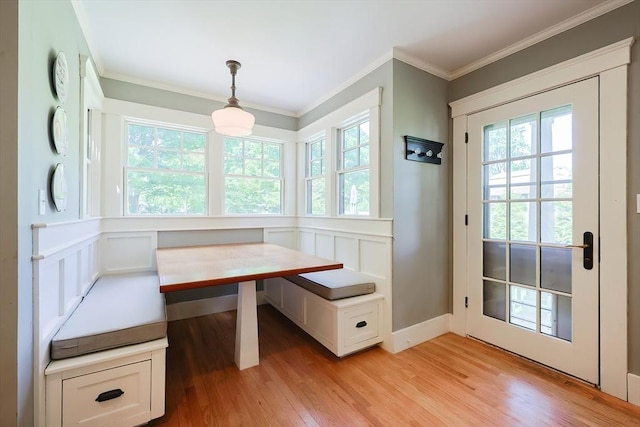 5 Baxter St, Westborough, MA 01581 - unfurnished dining area with breakfast area, light wood-style flooring, ornamental molding, a decorative wall, and wainscoting