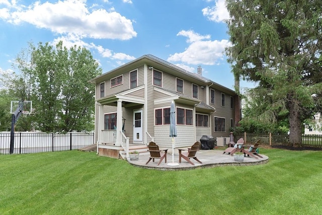 5 Baxter St, Westborough, MA 01581 - rear view of property featuring a chimney and a patio