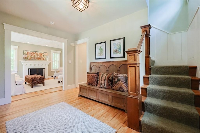 5 Baxter St, Westborough, MA 01581 - living room with stairs, light wood finished floors, and a fireplace