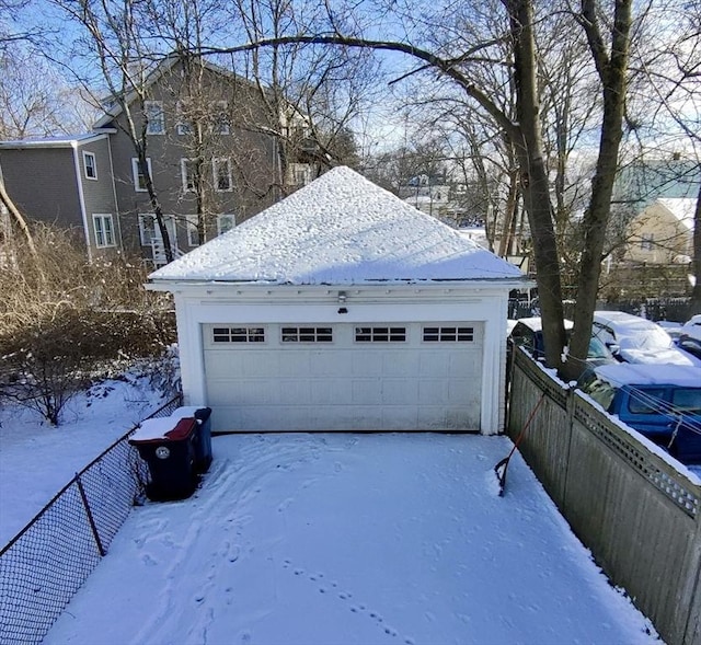 view of snow covered garage