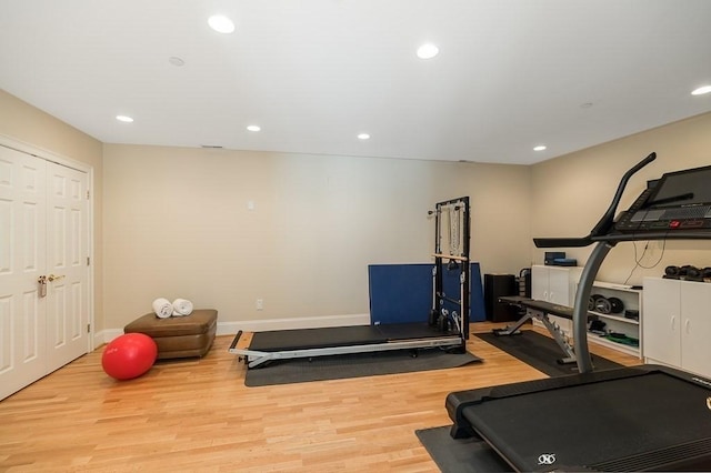 exercise area featuring light wood-type flooring