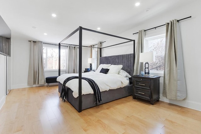 bedroom with light wood-type flooring