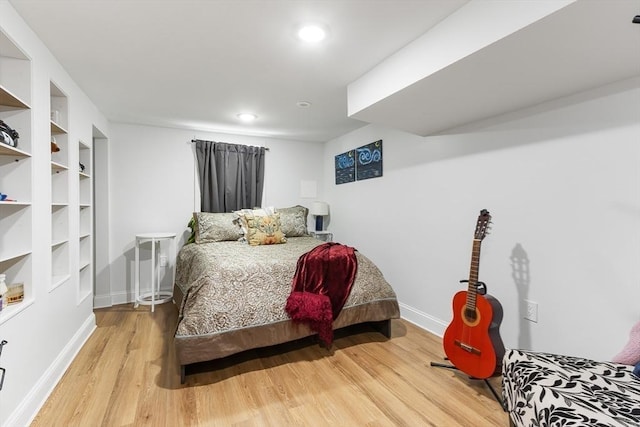 bedroom featuring wood-type flooring