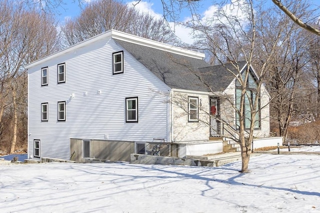 view of snow covered house