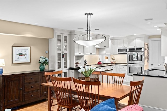 12 Braddock Park Unit 1, Boston, MA 02116 - dining room featuring light wood-style flooring and recessed lighting