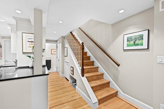 12 Braddock Park Unit 1, Boston, MA 02116 - stairway with wood finished floors, recessed lighting, and baseboards