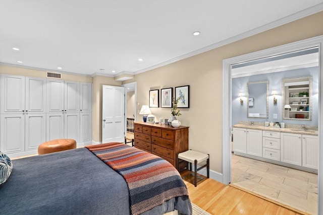 12 Braddock Park Unit 1, Boston, MA 02116 - bedroom with a sink, recessed lighting, crown molding, light wood-style flooring, and baseboards