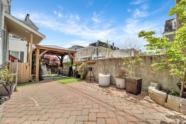 59 Bonair St, Somerville, MA 02145 - fenced backyard featuring a gazebo and a patio