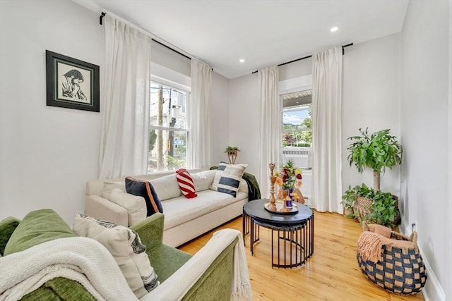 59 Bonair St, Somerville, MA 02145 - living room with healthy amount of natural light, light wood-type flooring, recessed lighting, and cooling unit