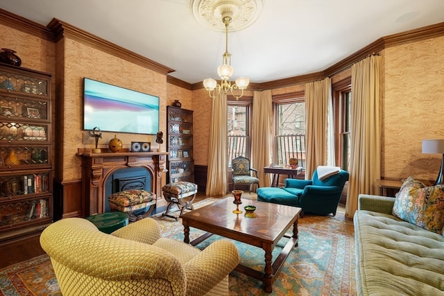 living room featuring wood-type flooring, crown molding, and a notable chandelier