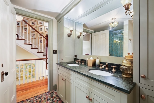 bathroom featuring wood-type flooring and vanity