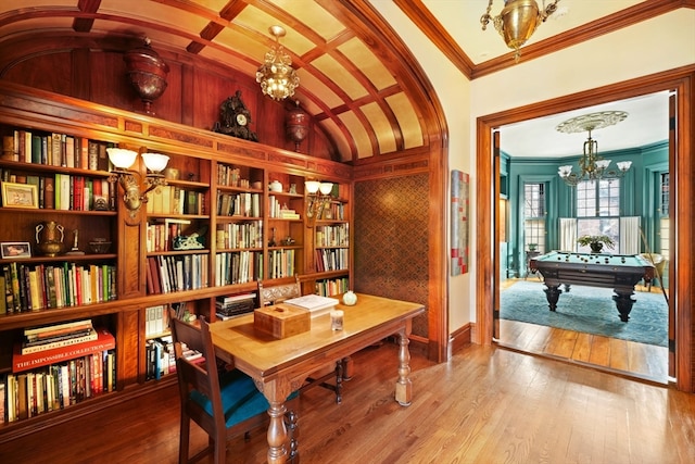 office featuring ornamental molding, a chandelier, hardwood / wood-style flooring, pool table, and vaulted ceiling