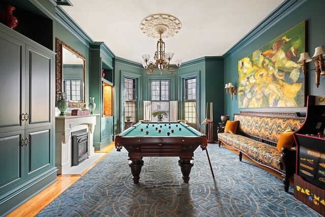 playroom with billiards, light hardwood / wood-style flooring, crown molding, and plenty of natural light